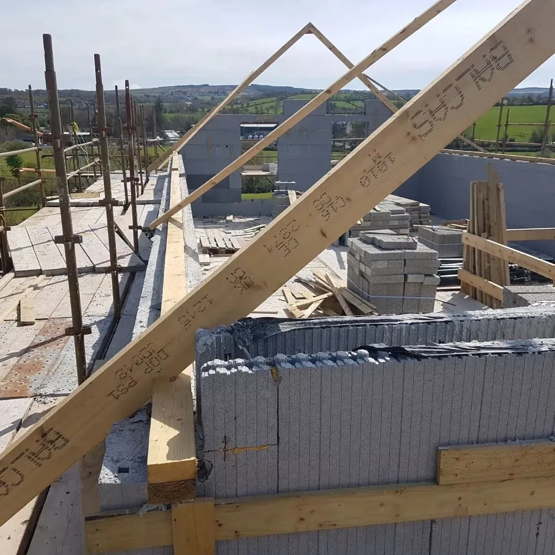 Roof trusses going up on ICF walls